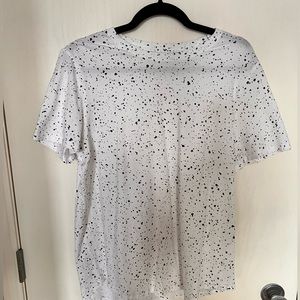Lululemon love tee. White with black  splatter pattern.  EUC size 10